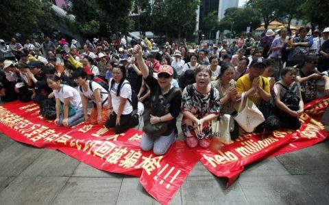 MBI总部人去楼空百名国人吉隆坡哭诉！重庆11名骨干吸金近6千万被起诉